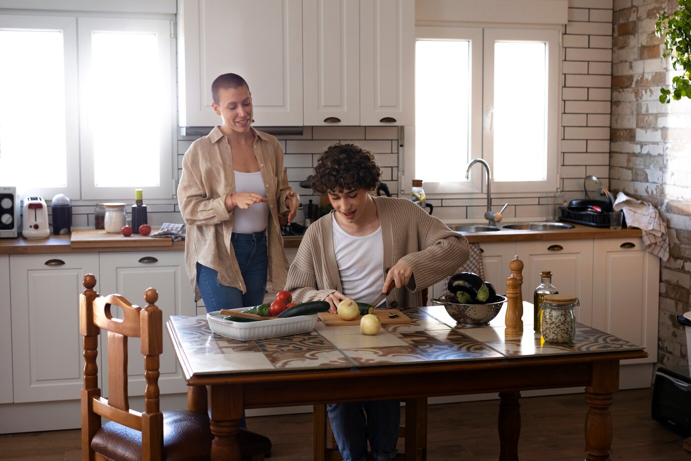 Person cleaning a kitchen counter